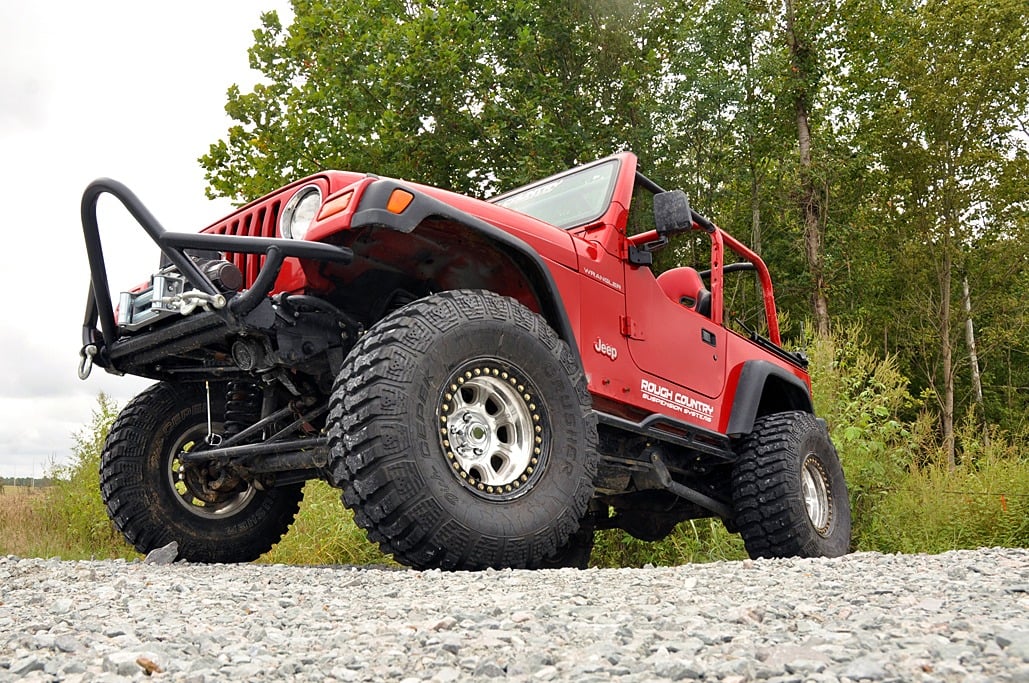 4 Inch Lift Kit Long Arm M1 Jeep Wrangler TJ 4WD (1997-2006) Rough Country
